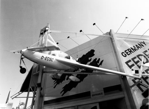 An
                  ultralight aircraft on display at the entrance to the
                  Federal Republic of Germany Pavilion, World Expo '88